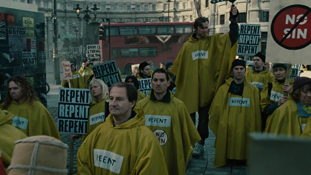 Repenters praying to God in Children of Men