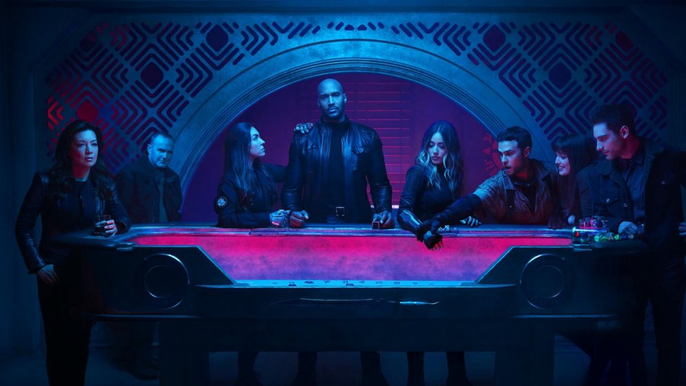 Shield cast at a pool table