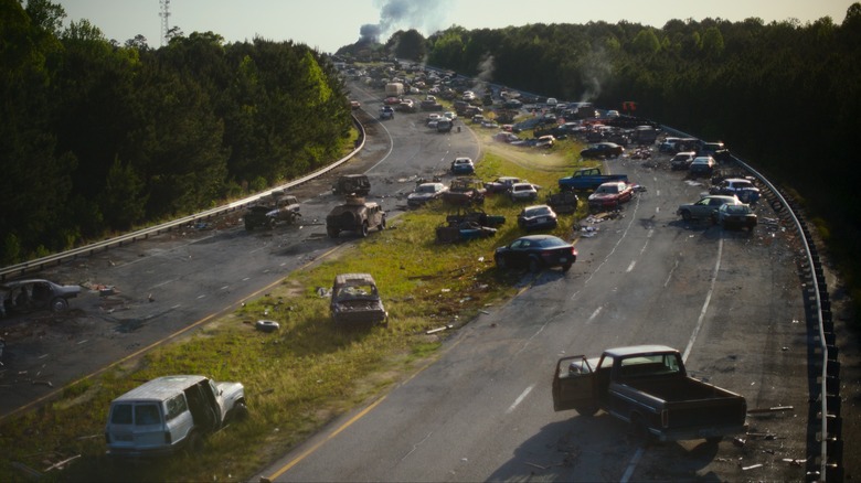 Abandoned cars on road