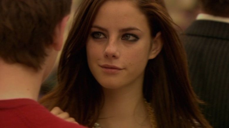 Effy looking at Cook