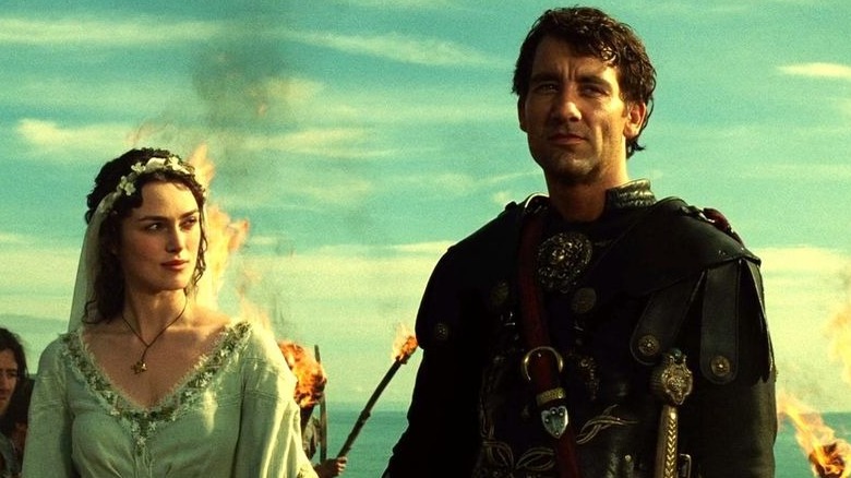 Guinevere and King Arthur stoic