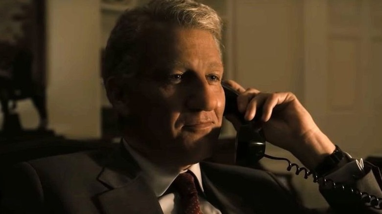 Clive Owen as Bill Clinton on phone