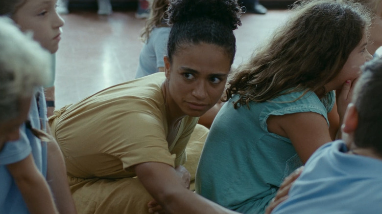 Lauren Ridloff in yellow dress in Sound of Metal