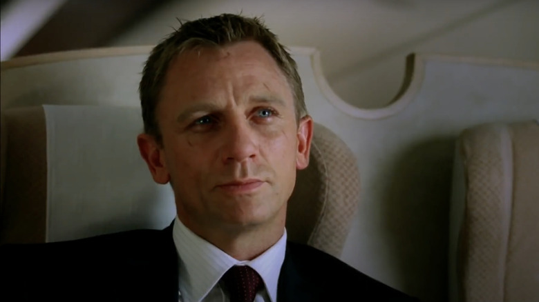 Daniel Craig smiling on train