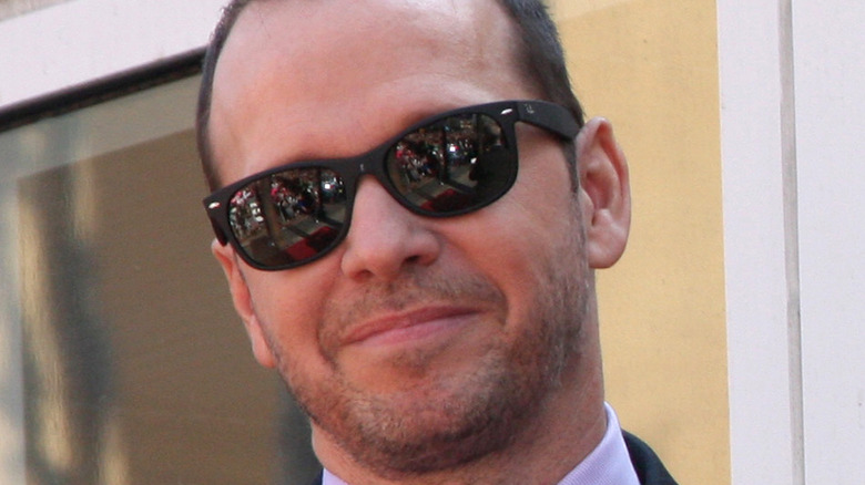 Donnie Wahlberg smirking