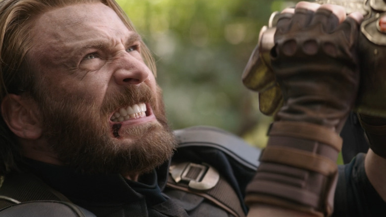 Captain America holds back Thanos at the end of Infinity War