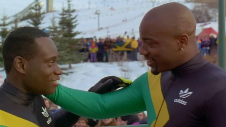 Junior Bevil and Yul Brenner prepare to bobsled