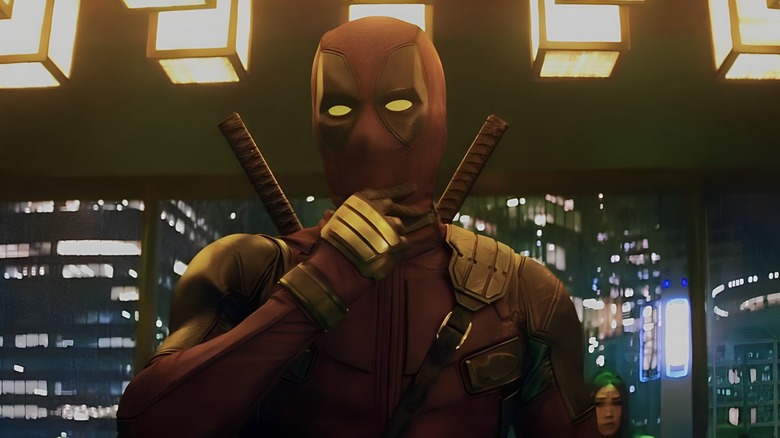 Deadpool rubbing chin