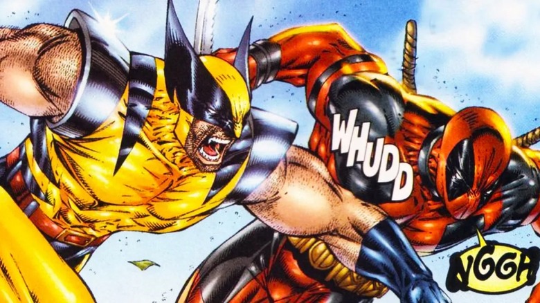 Wolverine punching Deadpool