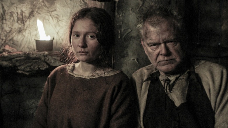 Emma Kenney stands with Jared Harris