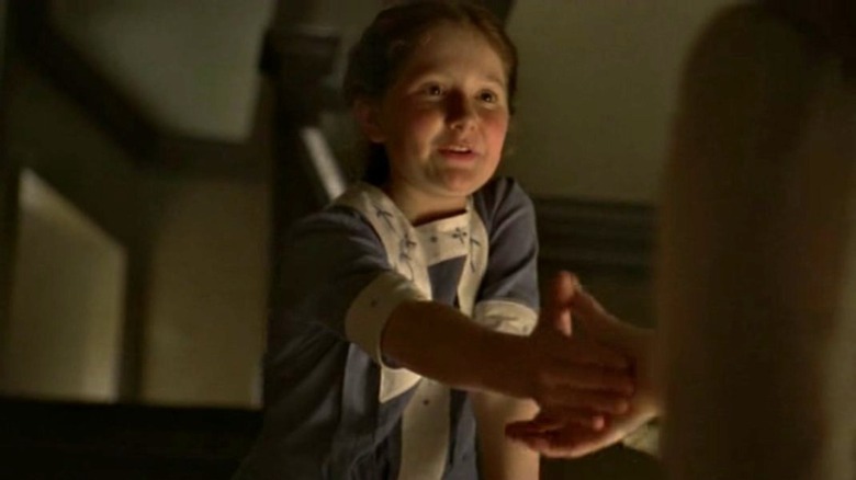 Emma Kenney shakes hands with someone