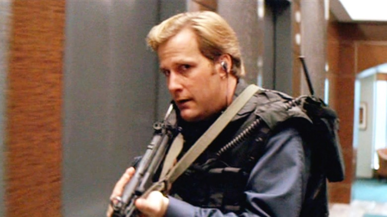 Jeff Daniels holding gun