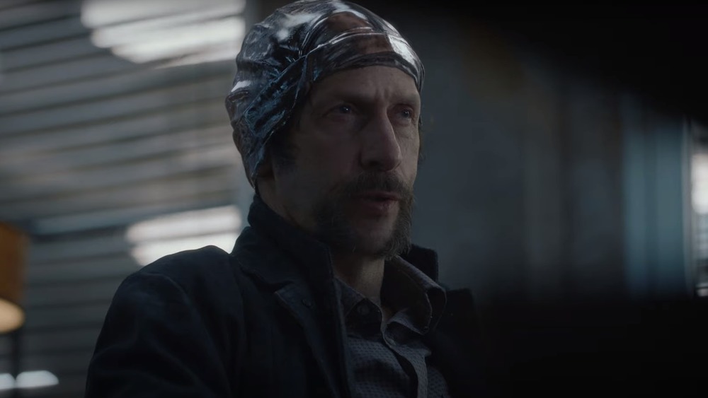 Tim Blake Nelson being interrogated 