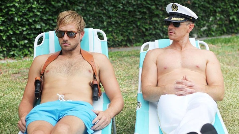 Ryan Hansen and Jason Dohring sitting on lounge chairs