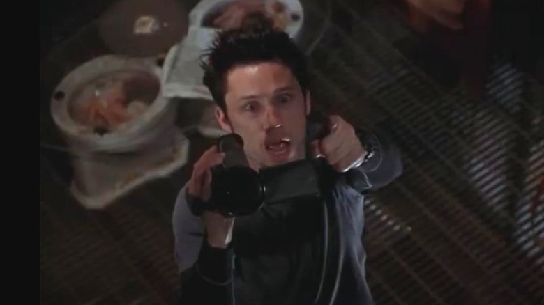 Jeff pointing a camera in Book of Shadows: Blair Witch 2