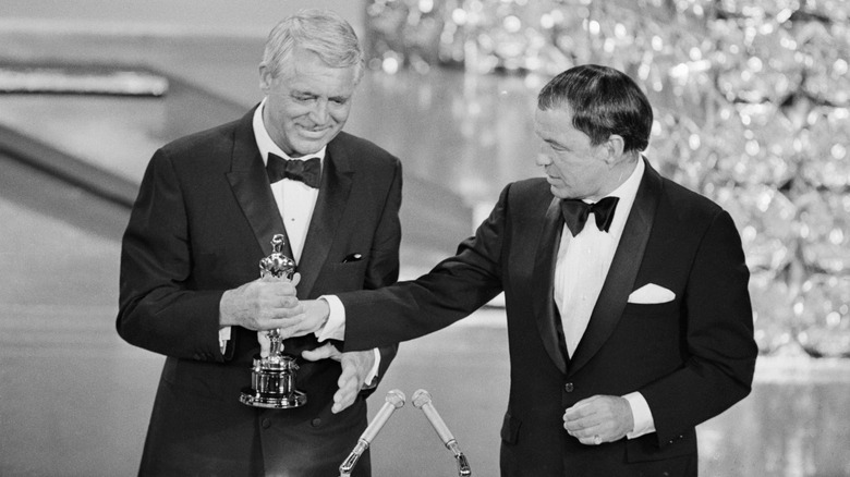 Cary Grant accepts Oscar