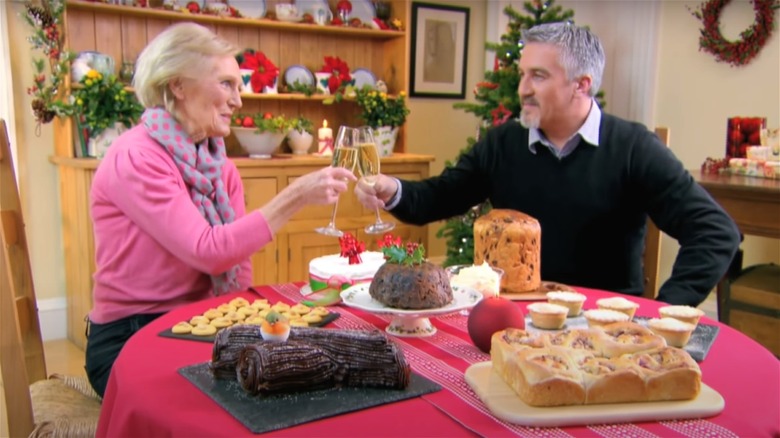 Mary Berry and Paul Hollywood clinking glasses