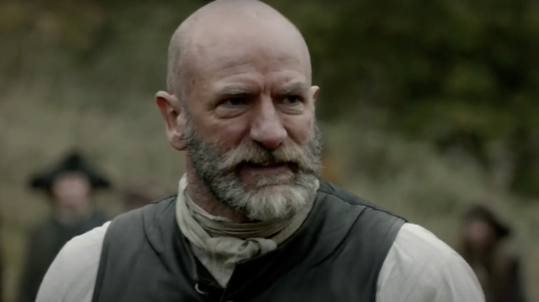 Dougal grimacing in Outlander