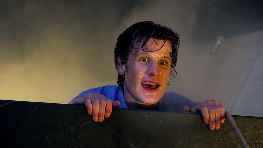 Matt Smith's Doctor pops out of the TARDIS on Doctor Who