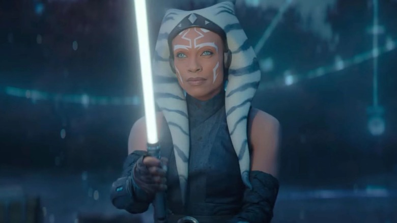 Ahsoka holding her lightsaber