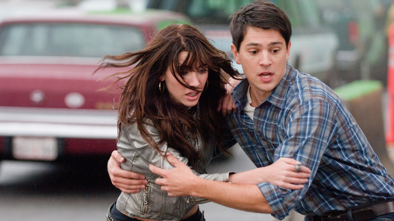 Nicholas D'Agosto as Sam in Final Destination 5, pulling Olivia to safety