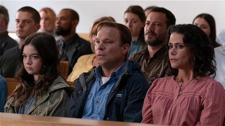 Carolyn sitting in court with the Roy family