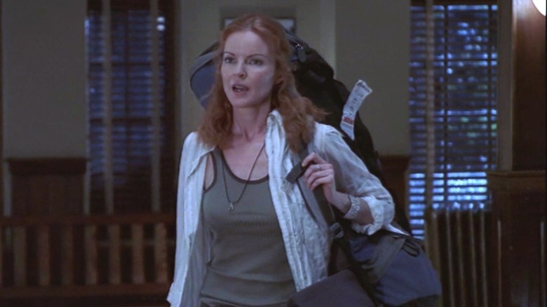 Marcia Cross holding bag Everwood