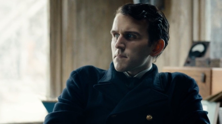 Harry Melling wearing a peacoat