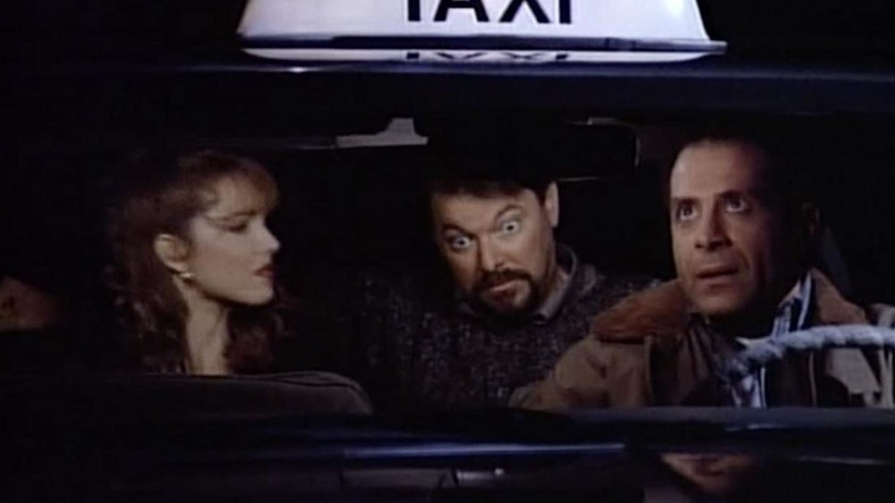 Casey Chappel Davenport, Gavin Ruthledge, and Antonio Scarpacci in a taxi