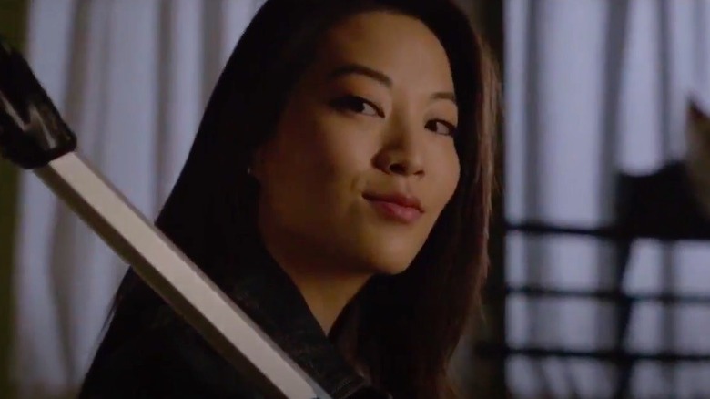 Arden Cho smirking as Kira in Teen Wolf