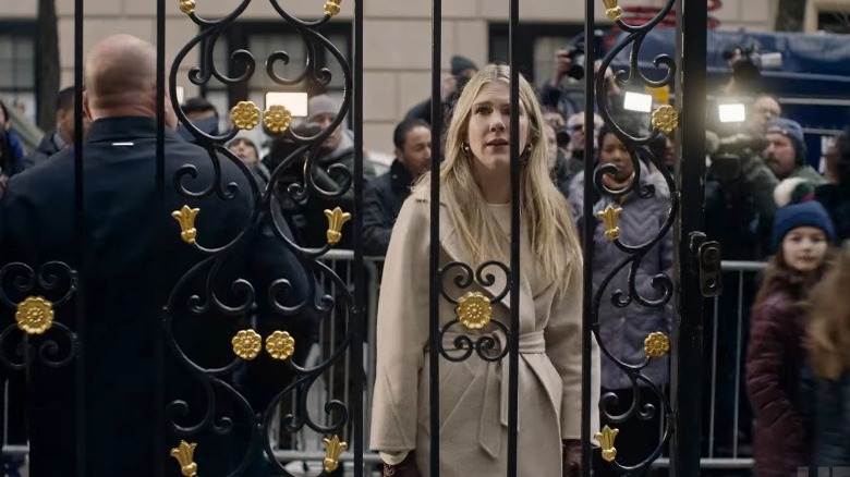 Sylvia Steinetz looks through a gate