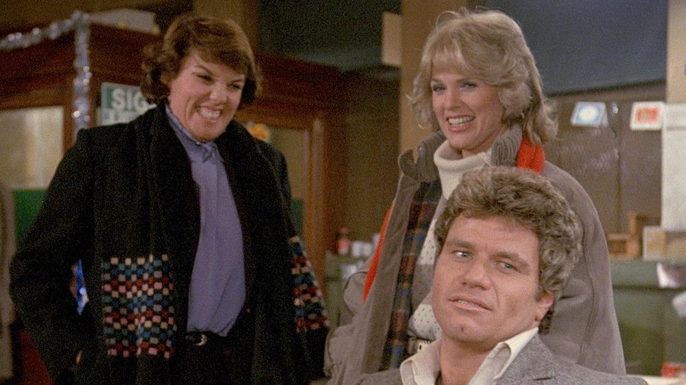 Cagney, Lacey, and Isbecki smiling