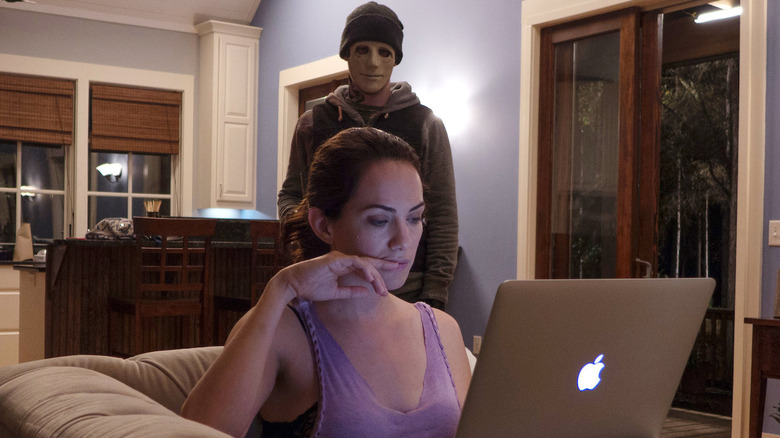 Kate Siegel as Maddie in front of laptop in Hush