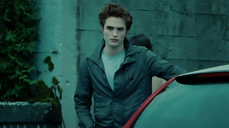 Edward at car staring