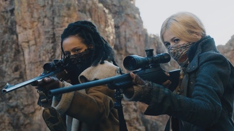 Harriet and Sonya hold guns maze runner