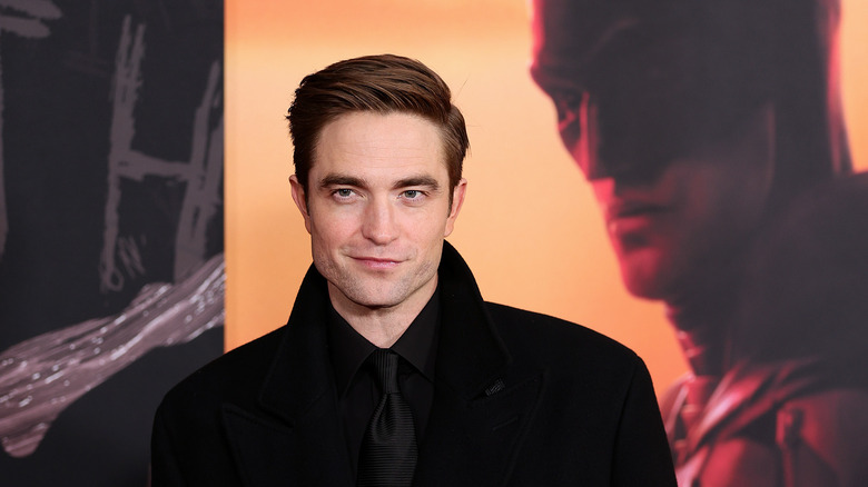 Robert Pattinson smirking 