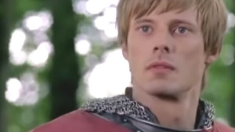 King Arthur staring at Merlin