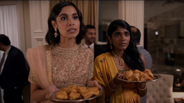 Alia holding tray of food