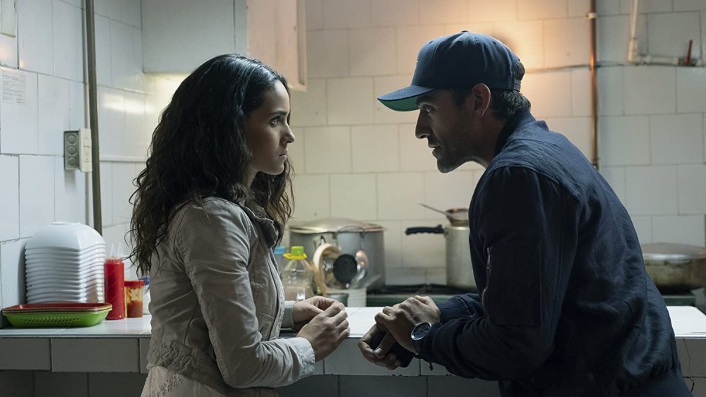 Adria Arjona and Oscar Issac as Yovanna and Santiago