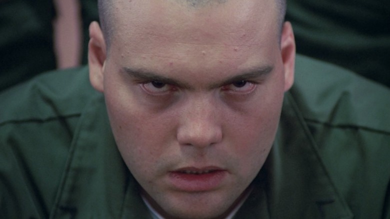 Vincent D'onofrio leaning foward