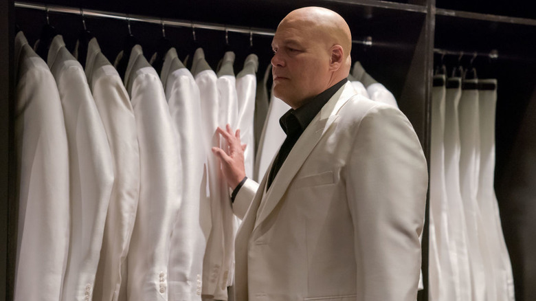 Kingpin checking his suits