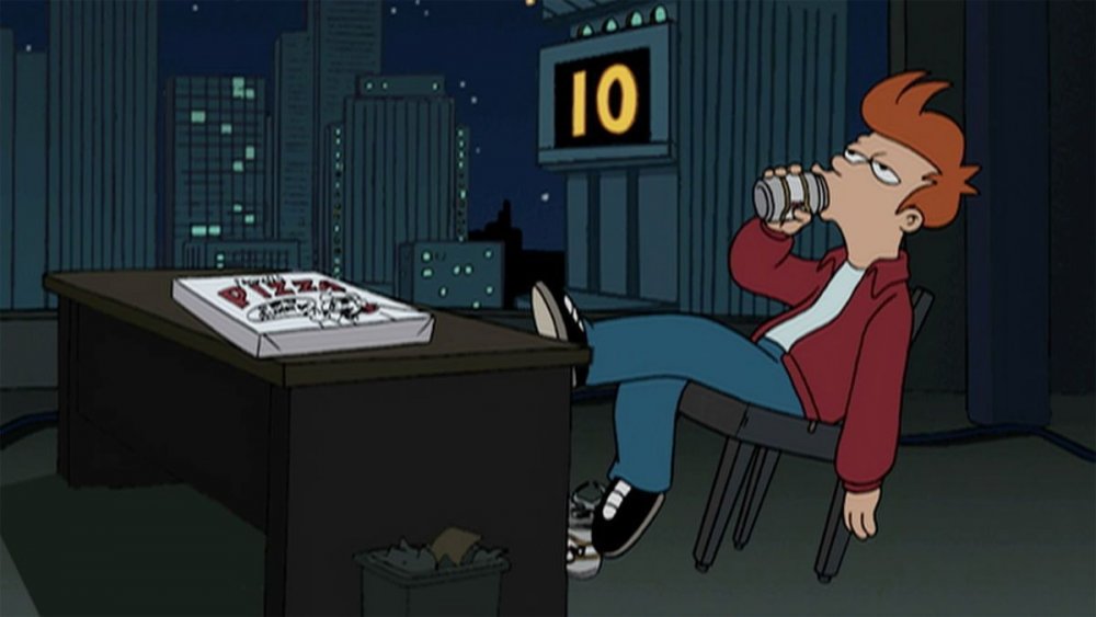 Fry drinks a beer during his last moments in the 20th century on Futurama