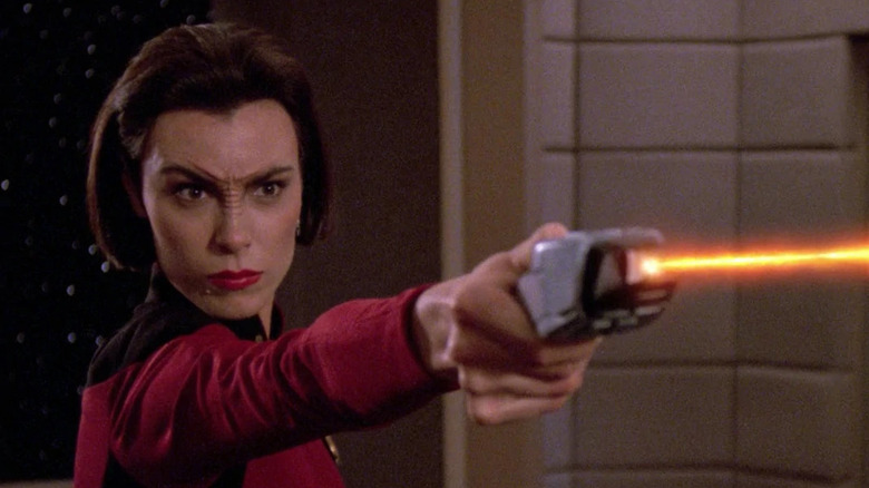 Ro Laren shoots phaser