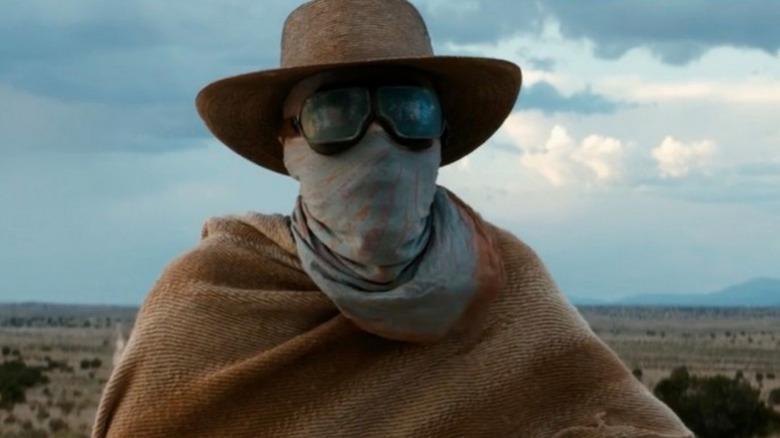 Caliban wearing goggles and hat in Logan XMen movie