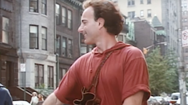 Graham Knox walking bike in New York City