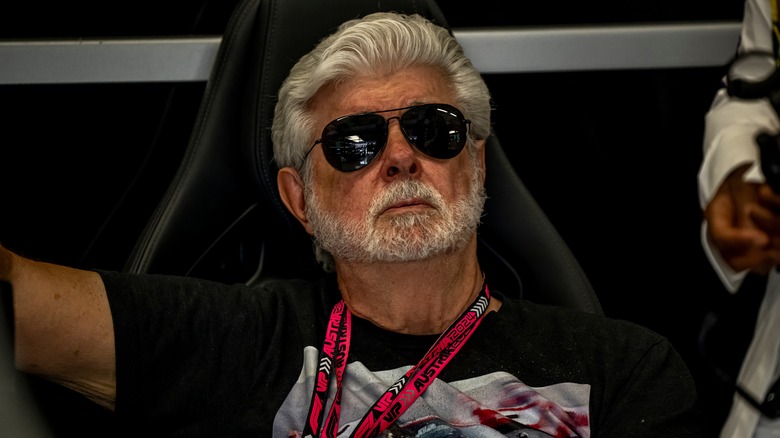 George Lucas relaxing in chair 