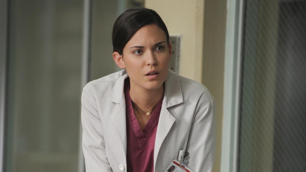 Odette Annable wearing lab coat