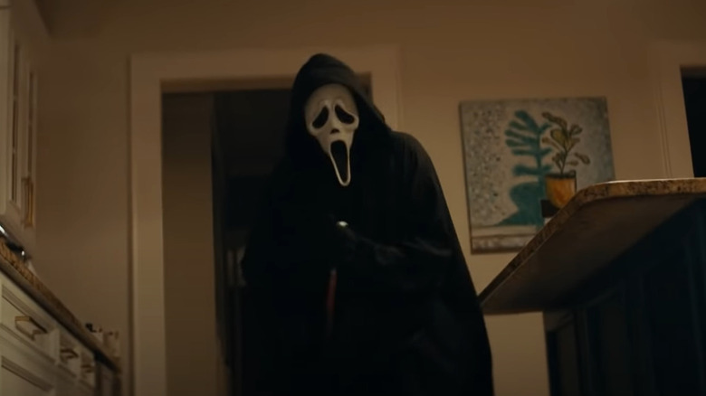 Ghostface looming over victim