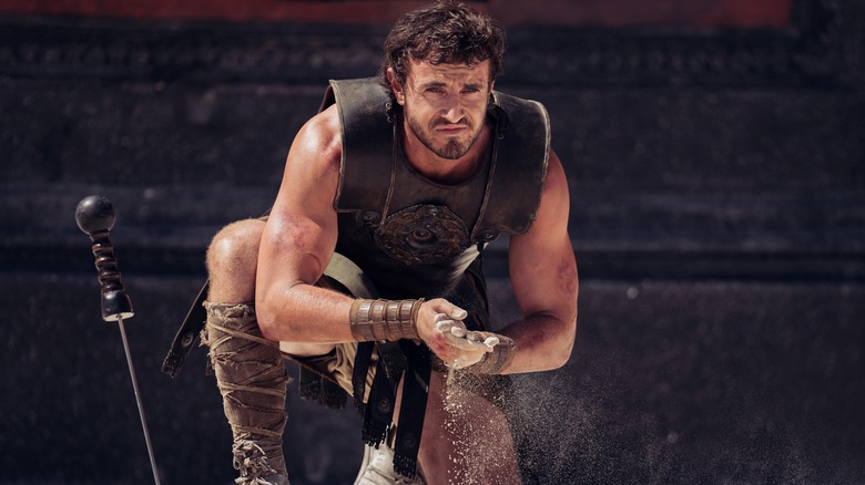 Lucius Verus Aureliu kneeling in the Colosseum