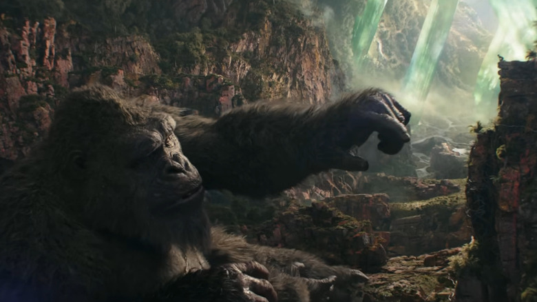 Kong reaches out hand